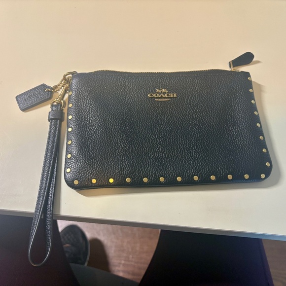 Coach Handbags - Coach black wristlets with gold rivets